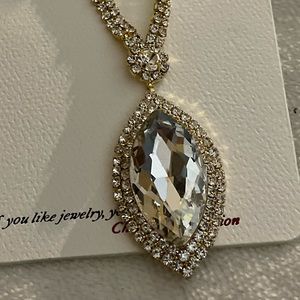 Large crystal teardrop with matching earrings new with tags done